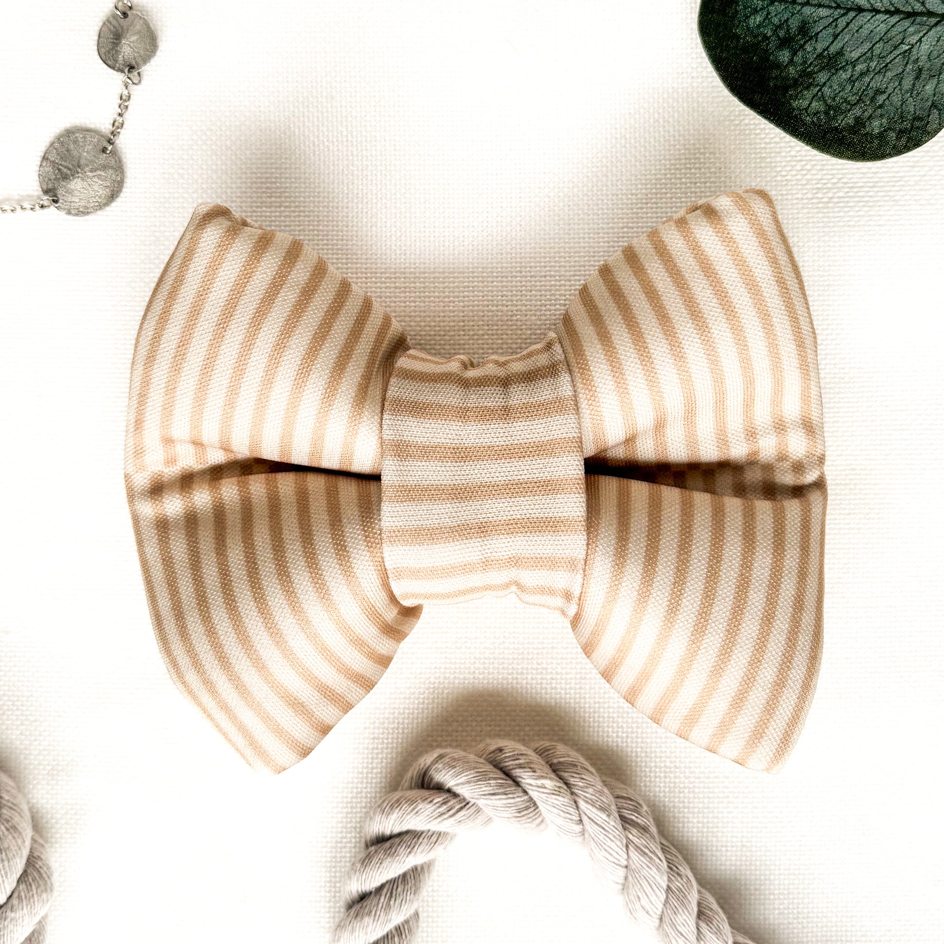 A yellow striped classic dog bowtie.